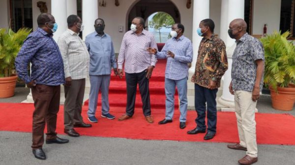 President Uhuru Kenyatta and Raila Odinga with the OKA alliance principals at the State House in Mombasa